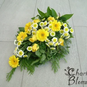 Sorgbukett i gula nyanser