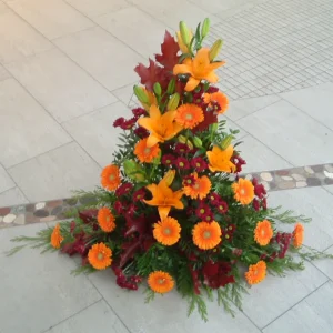 Sorgdekoration hög i orange toner