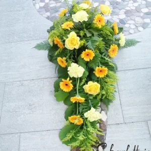 Sorgdekoration låg i gult